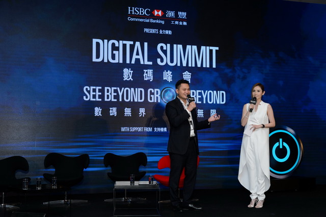 Two people presenting on stage at the Hong Kong digital summit.