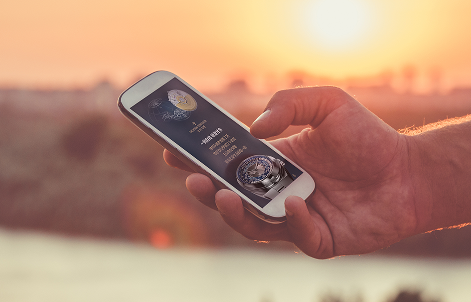 A smartphone capturing the award-winning effect of digital marketing at sunrise.