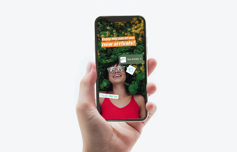 A woman is showcasing an award-winning digital marketing campaign in Hong Kong through a phone screen.