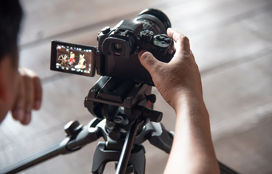 A person holding an award-winning camera in Hong Kong.