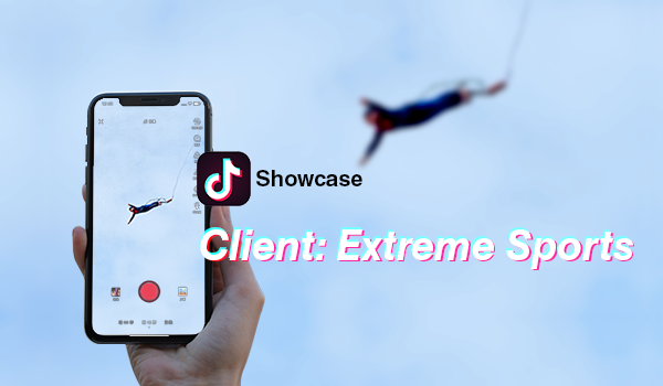 A person in Hong Kong is holding up an award-winning phone to showcase extreme sports for SEO purposes.